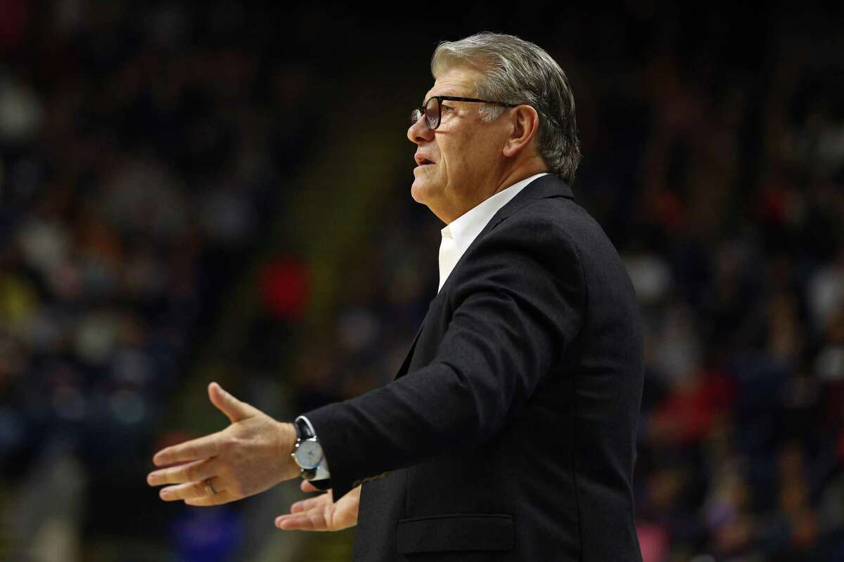 BRIDGEPORT, CONNECTICUT - MARCH 28: Head coach Geno Auriemma of the UConn Huskies reacts during the first half against the NC State Wolfpack in the NCAA Women's Basketball Tournament Elite 8 Round at Total Mortgage Arena on March 28, 2022 in Bridgeport, Connecticut. (Photo by Elsa/Getty Images)