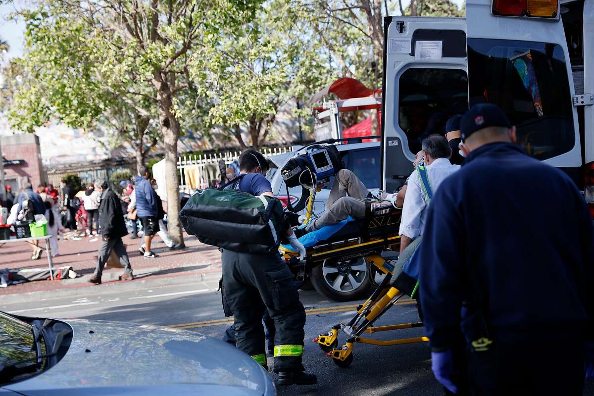 Emergency responders respond to a medical call at the McDonald’s at Mission and 24th Street on Thursday, March 24, 2022 in San Francisco, Calif.
