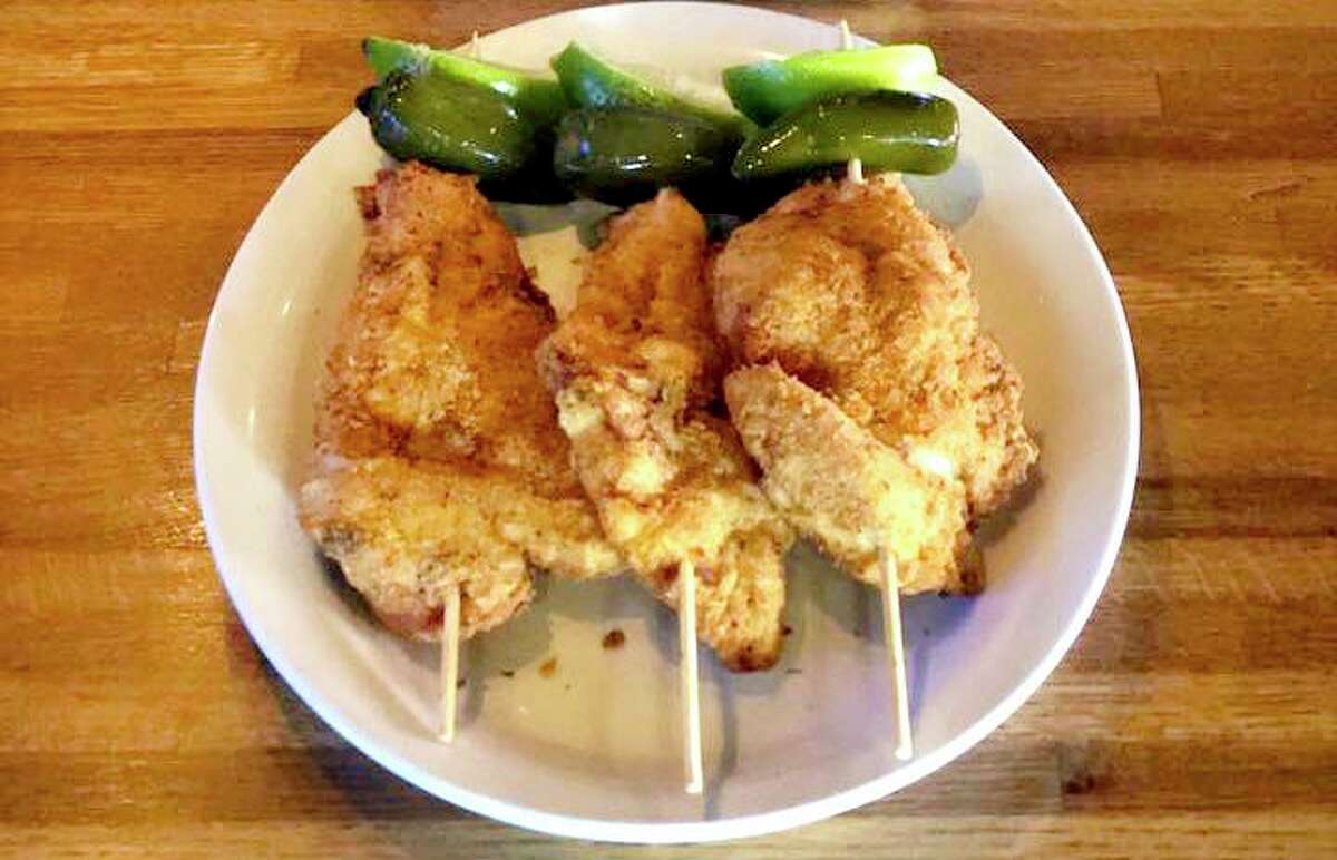 Anchor Bar in San Antonio is among the top-rated places in San Antonio to get chicken on a stick, a foodie favorite during Fiesta.