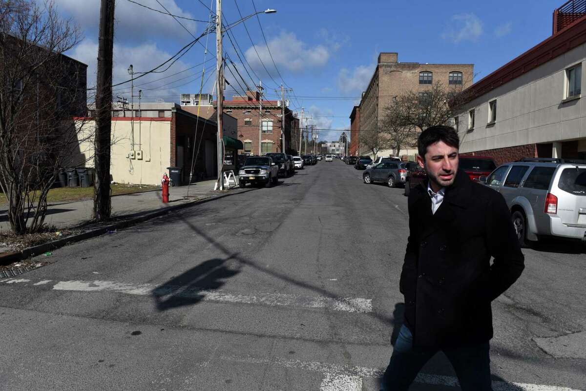 Albany County Legislator Sam Fein walks along S. Pearl Street, which is part of his district, at Arch Street in Albany.