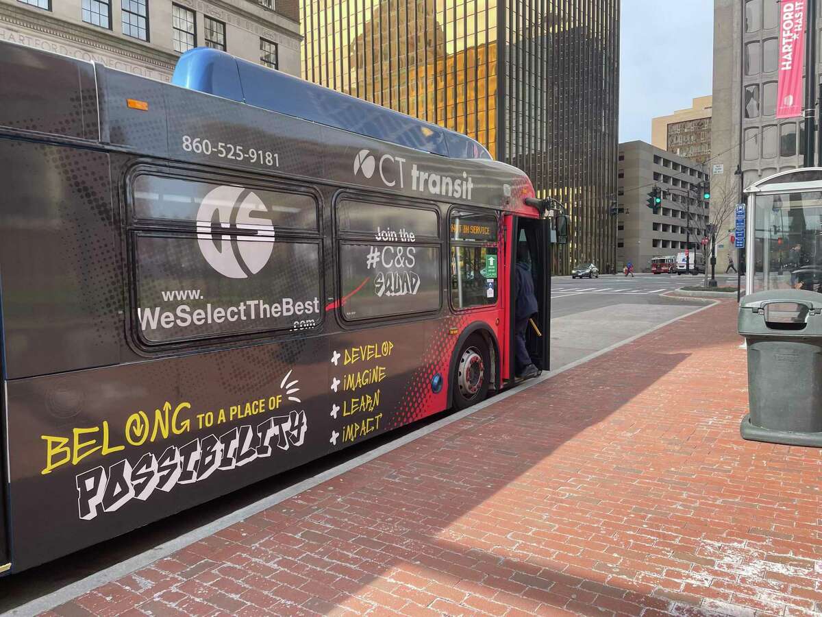 A CT Transit bus outside the Old State House on Main Street in Hartford on Wednesday. Public buses will be free beginning April 1 through June 30, 2022.