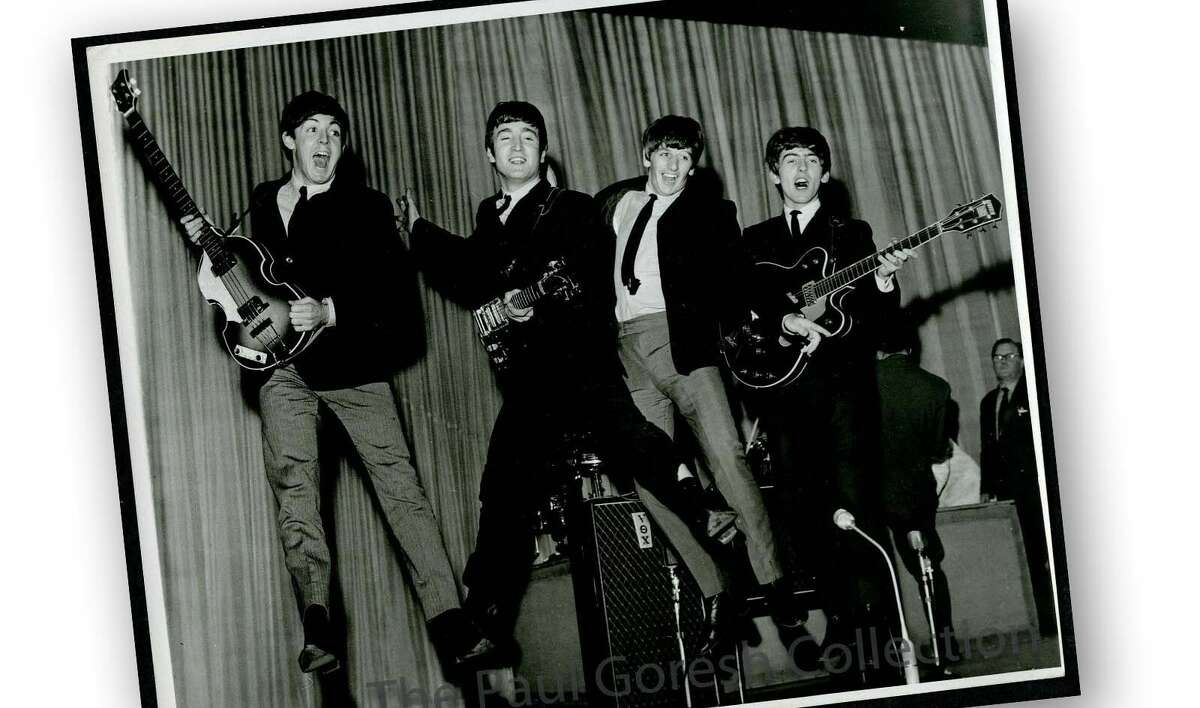 Beatles jumping during rehearsal (staged shot)1.jpg