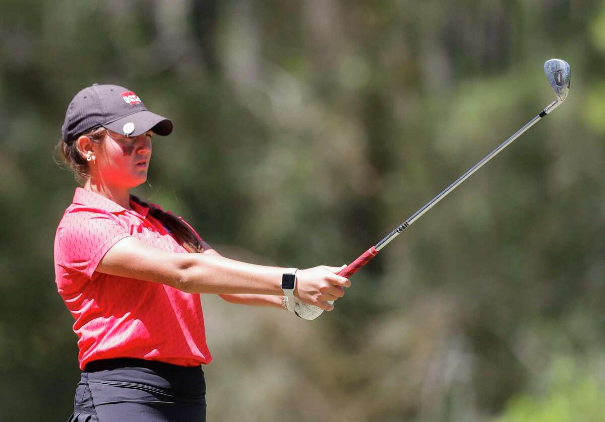 Veronica Exposito of The Woodlands lines up a shot off the seventh tee box during the District 13-6A golf championships, Wednesday, March 30, 2022, in Magnolia.
