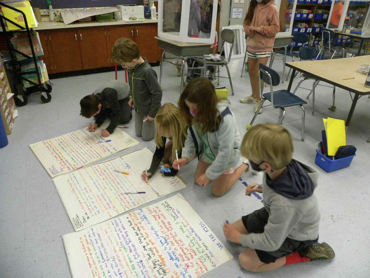 Students of Joan Robb’s former 3rd grade class making letters urging the Fairfield delegation to make lollipops the state candy.