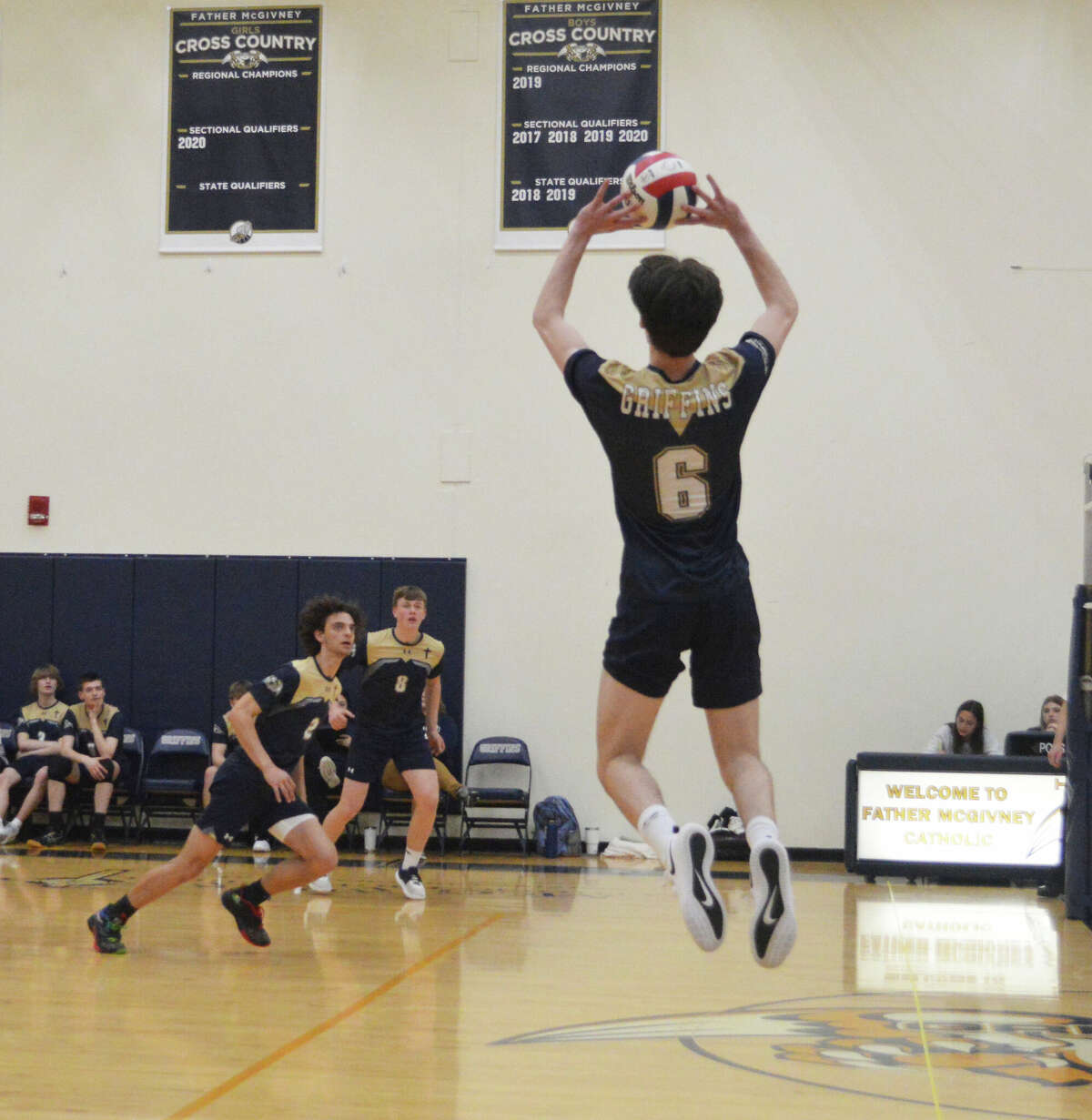 Devon Silhavey sets up Darren Luchetti for the kill in the win against Whitfield on Wednesday.