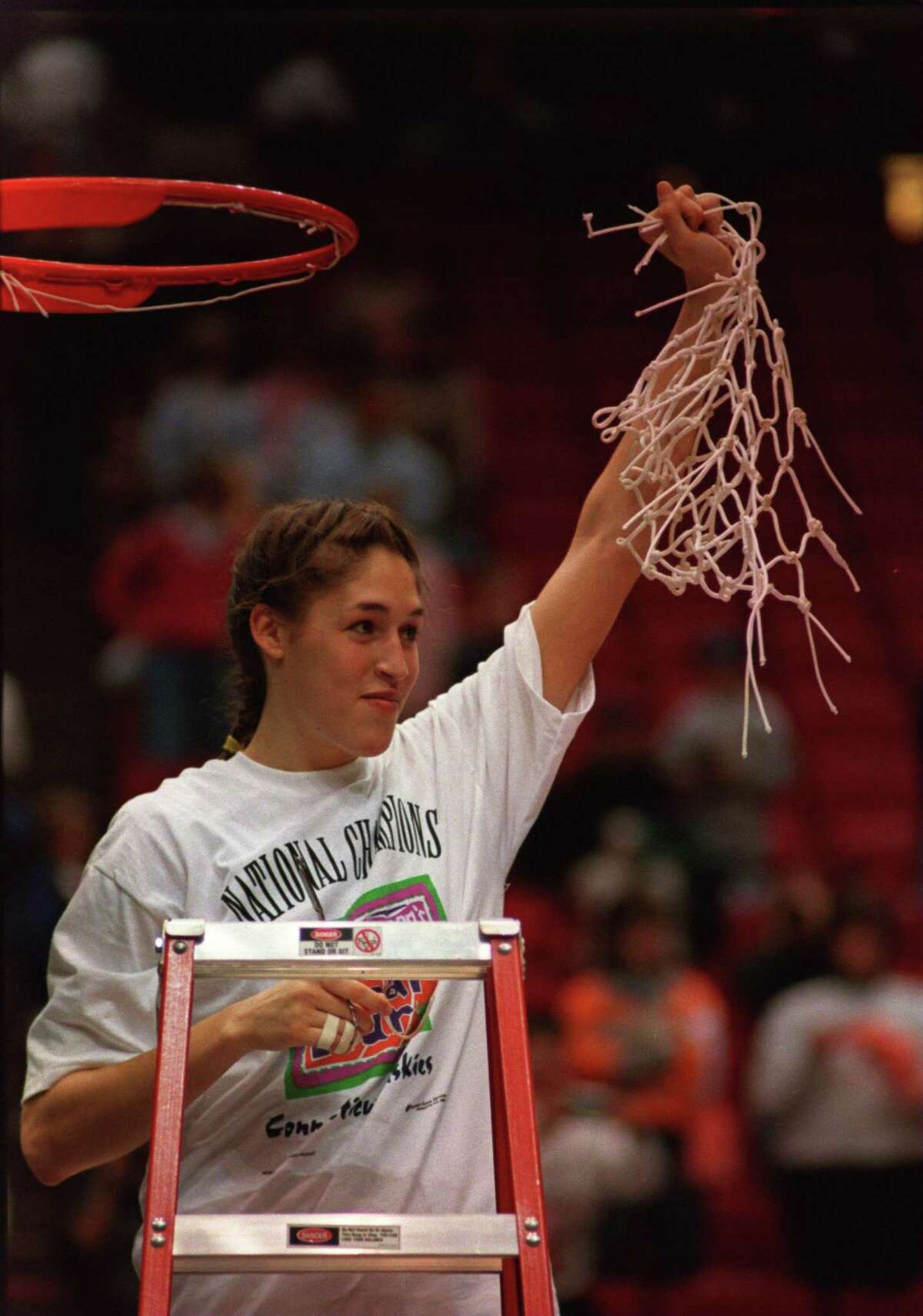 2 Apr 1995: MVP REBECCA LOBO OF THE CONNECTICUT HUSKIES HOLDS UP THE NET AFTER CUTTING IT FROM THE RIM IN CELEBRATION OF HER TEAM WINNING THE NATIONAL CHAMPIONSHIP OF THE WOMEN''S NCAA FINAL AT THE TARGET CENTER IN MINNEAPOLIS, MINNESOTA. CONNECTICUT DEFEA