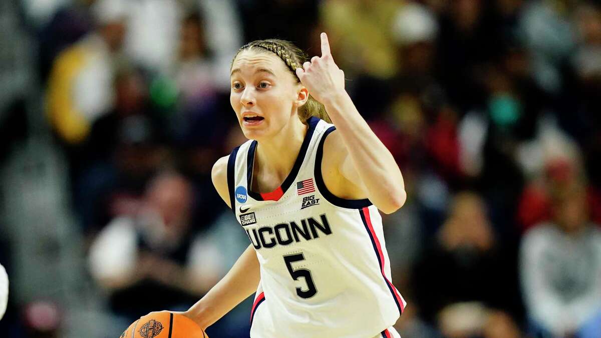 Connecticut guard Paige Bookers (5) during the first quarter of a college basketball game against Indiana in the Sweet Sixteen Round of the NCAA Women's Tournament on Saturday, March 26, 2022 in Bridgeport, Connecticut (AP Photo /Frank Franklin II)