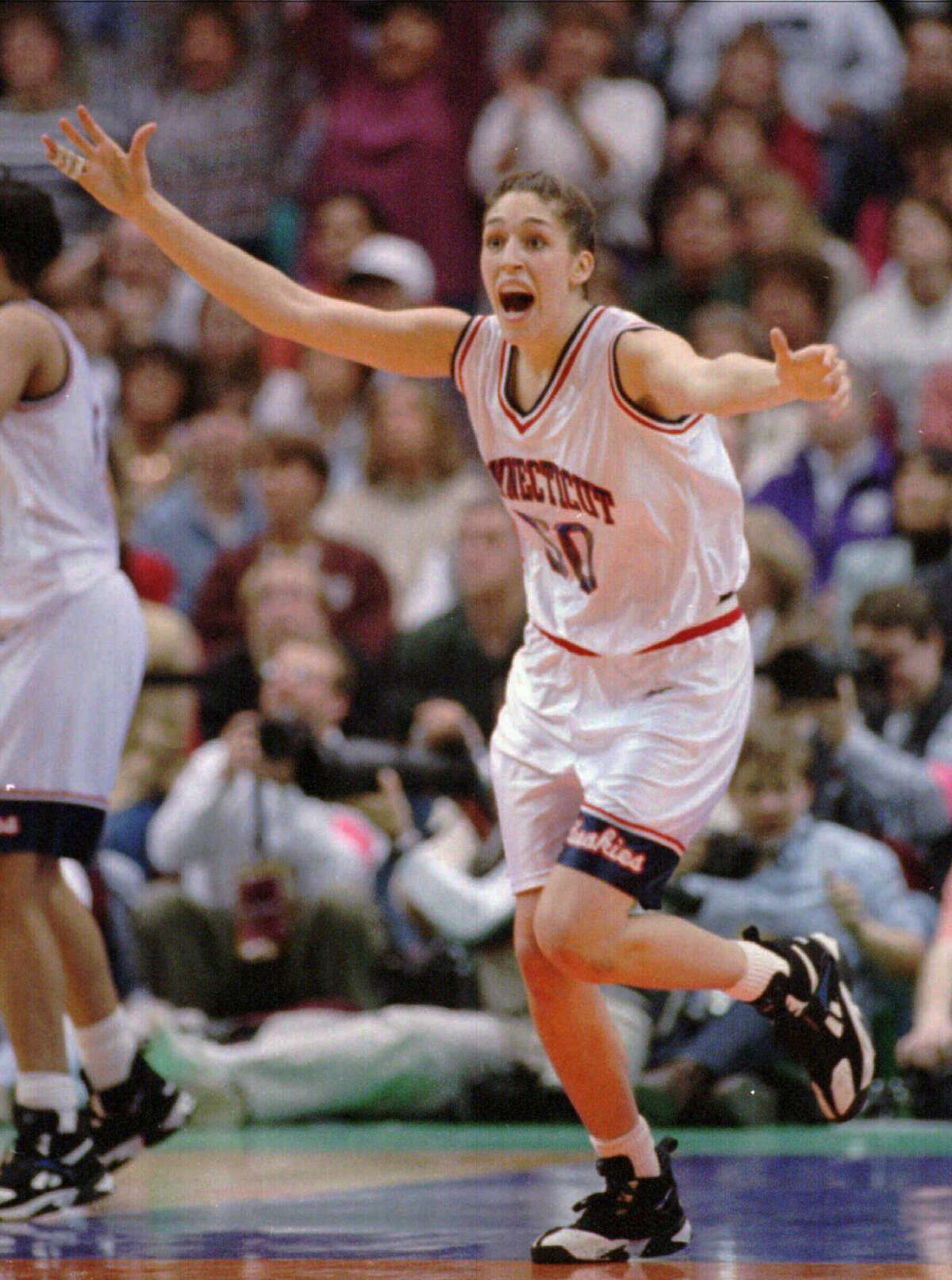 Connecticut's Rebecca Lobo races down the court after Connecticut won the NCAA Women's Final Four, 70-64, over Tennessee Sunday, April 2, 1995, in Minneapolis. Lobo led her team with 17 points and was named the outstanding player of the tournament. (AP Photo/Elise Amendola)