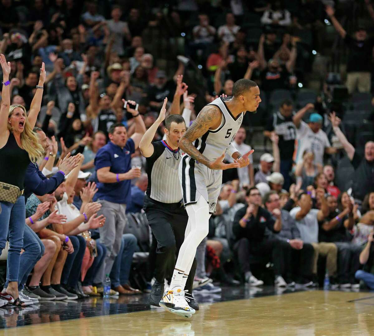 Crowd cheers after a three by San Antonio Spurs guard Dejounte Murray (5) in second half. Memphis Grizzlies defeated the San Antonio Spurs 112-111on Wednesday, March 30, 2022 at the AT&T Center.