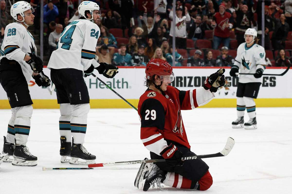 GLENDALE, ARIZONA - MARCH 30: Barrett Hayton #29 of the Arizona Coyotes reacts after scoring a goal against the San Jose Sharks during the third period of the NHL game at Gila River Arena on March 30, 2022 in Glendale, Arizona. The Coyotes defeated the Sharks 5-2. (Photo by Christian Petersen/Getty Images)