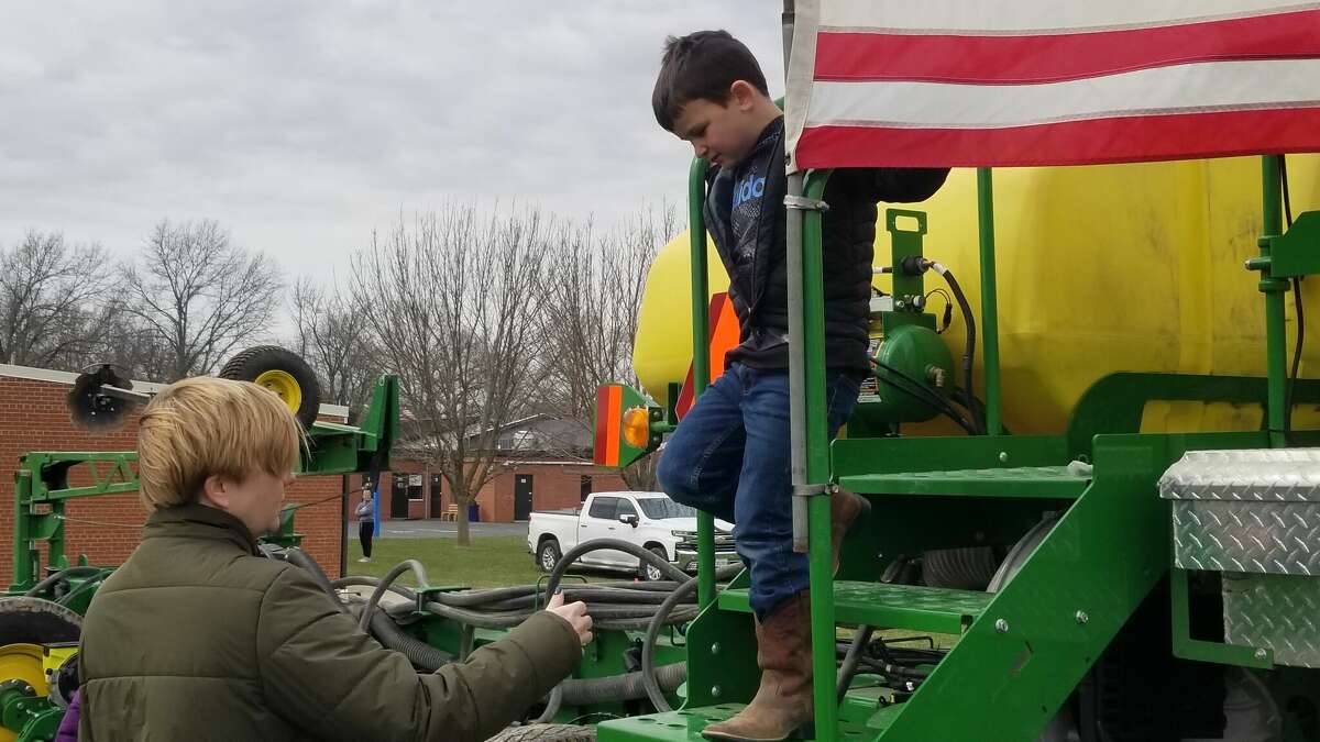 Students at Midway Elementary learned about farming equipment and how farmers take care of their animals during Midway Elementary School's first Ag Day on Tuesday. 