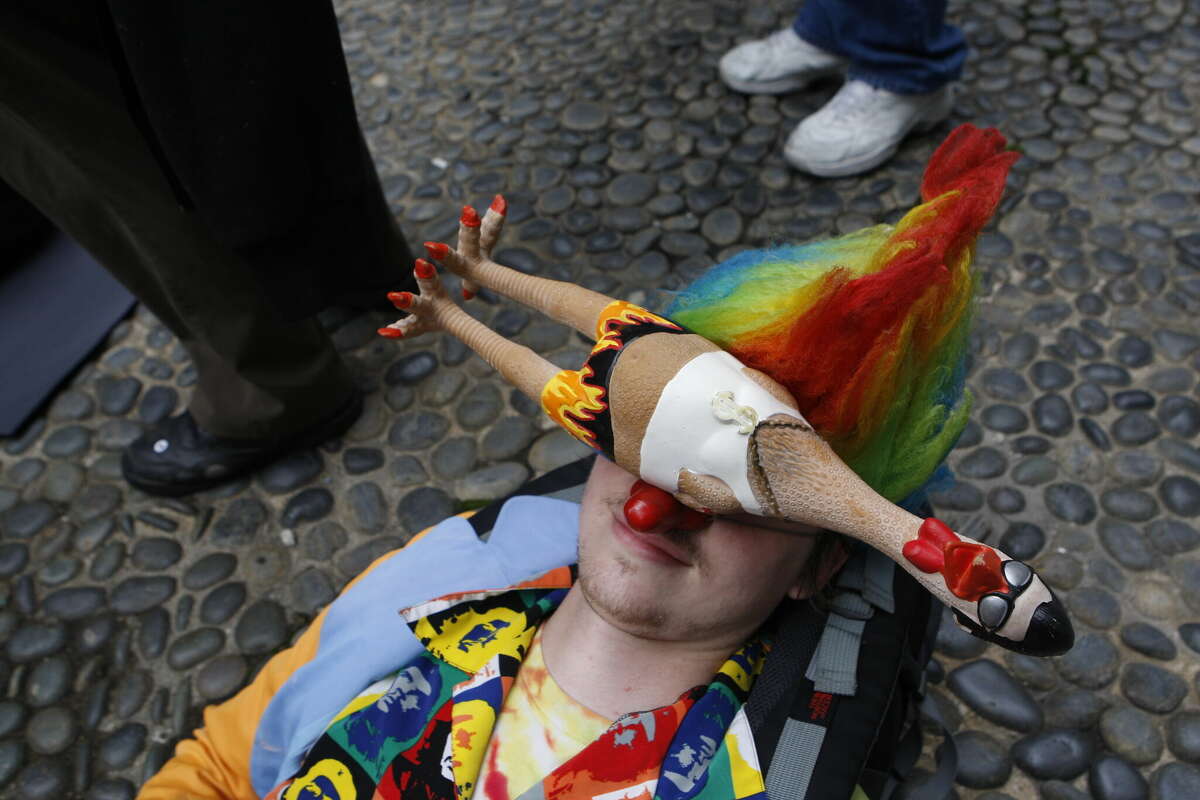 Lars Adams from Oakland takes a break during the 35th annual St. Stupid's Day Parade through the Financial District in San Francisco on Monday, April 1, 2013.