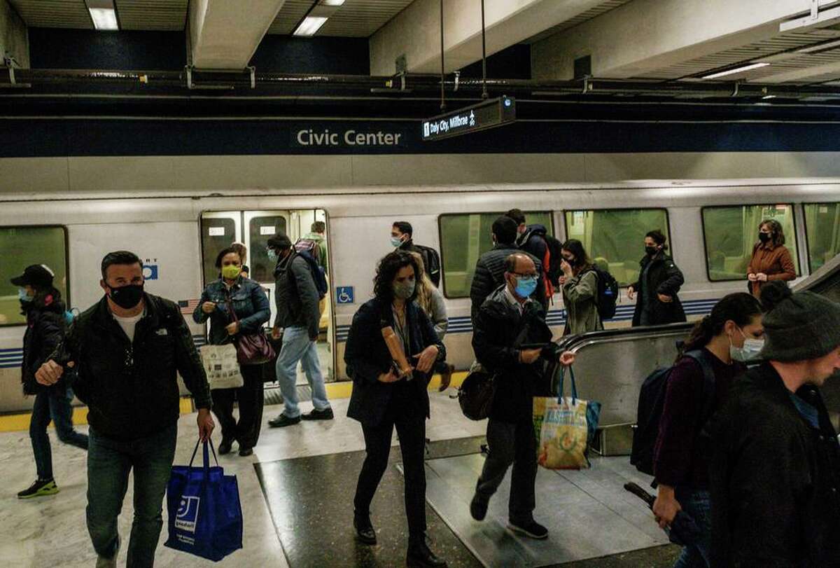 BART riders are seen at the Civic Center station in San Francisco in November 2021. Ridership rates have increased in March, and point to a possible new peak travel week as riders figure out hybrid work schedules.