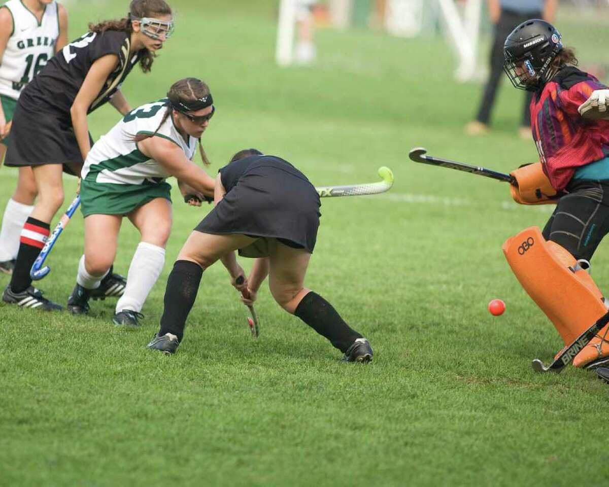 Joel Barlow goalie Morgan Netherwood makes a save on a shot by New Milford's Erin Shannon (13) during their SWC match Wednesday at New Milford High.