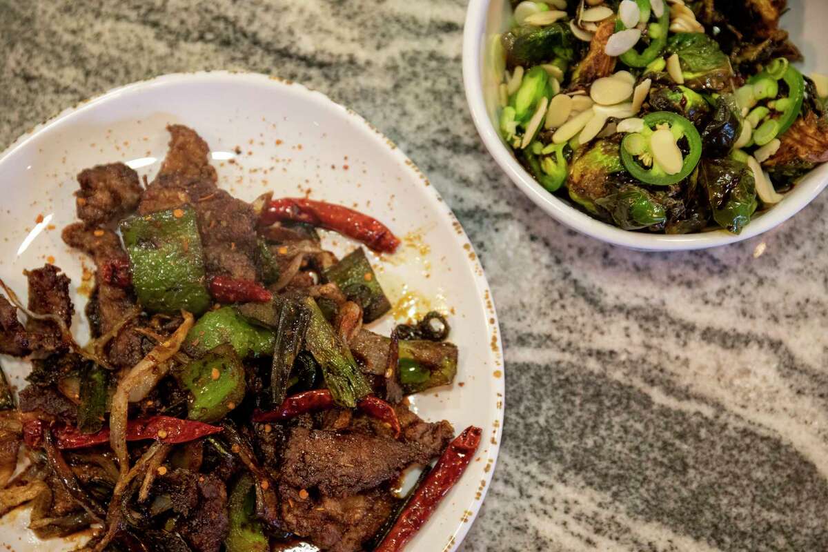Mr. Chip’s Kitchen’s Mongolian beef dish and crispy brussels as seen Thursday, March 31, 2022 at 607 N. Colorado St. Jacy Lewis/Reporter-Telegram