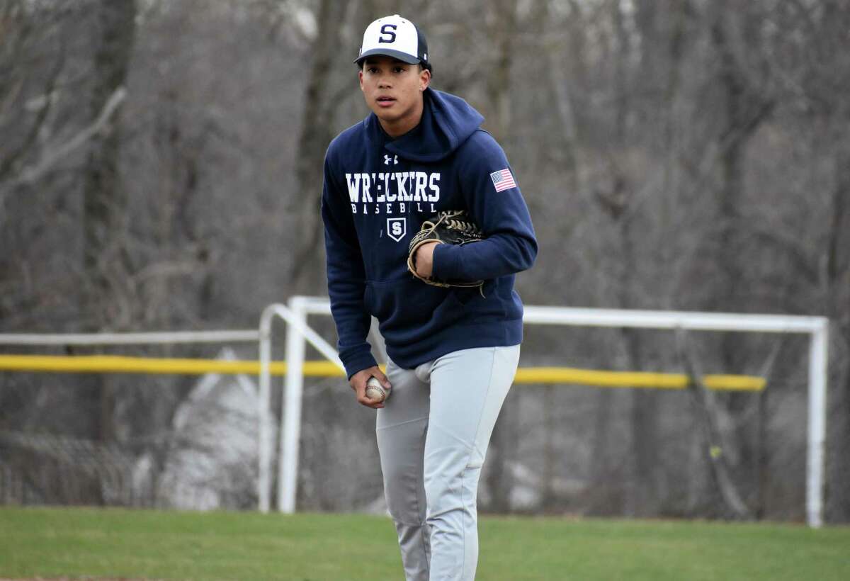 Staples’ Hiro Wyatt transferred from The King School and will be an impact player for the Staples baseball team. Wyatt pitches at Staples High School, Westport on Wednesday, March 30, 2022.