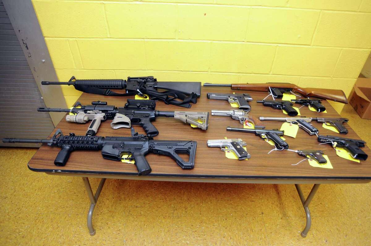 FILE PHOTO: Seized firearms from the evidence locker within the Stamford police headquarters in downtown Stamford, Conn. in 2017. Lawmakers advanced legislation on Thursday that would provide $2.5 million in funding over the next two years to investigate illegal firearms trafficking.