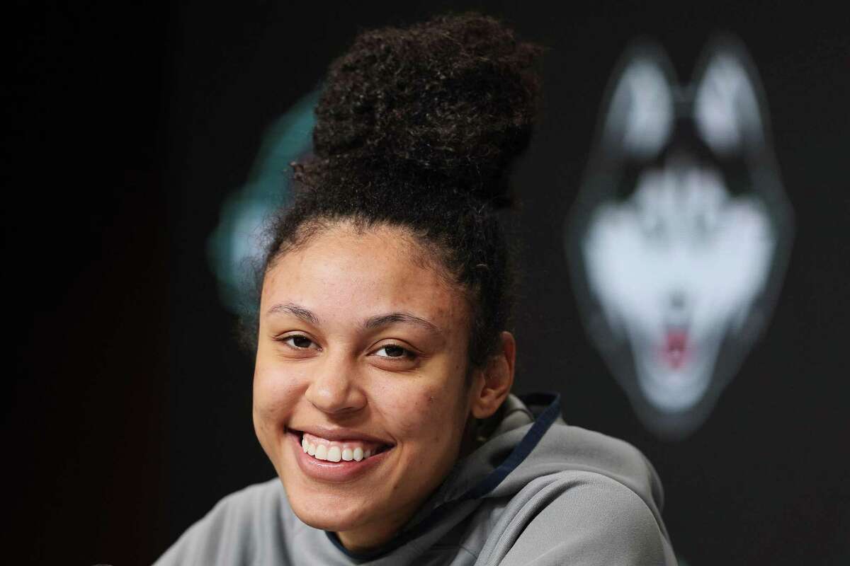 MINNEAPOLIS, MINNESOTA - MARCH 31: Olivia Nelson-Ododa #20 of the UConn Huskies speaks to reporters before a practice session with the team at Target Center on March 31, 2022 in Minneapolis, Minnesota. The UConn Huskies will play the Stanford Cardinal on April 1, 2022. (Photo by Andy Lyons/Getty Images)