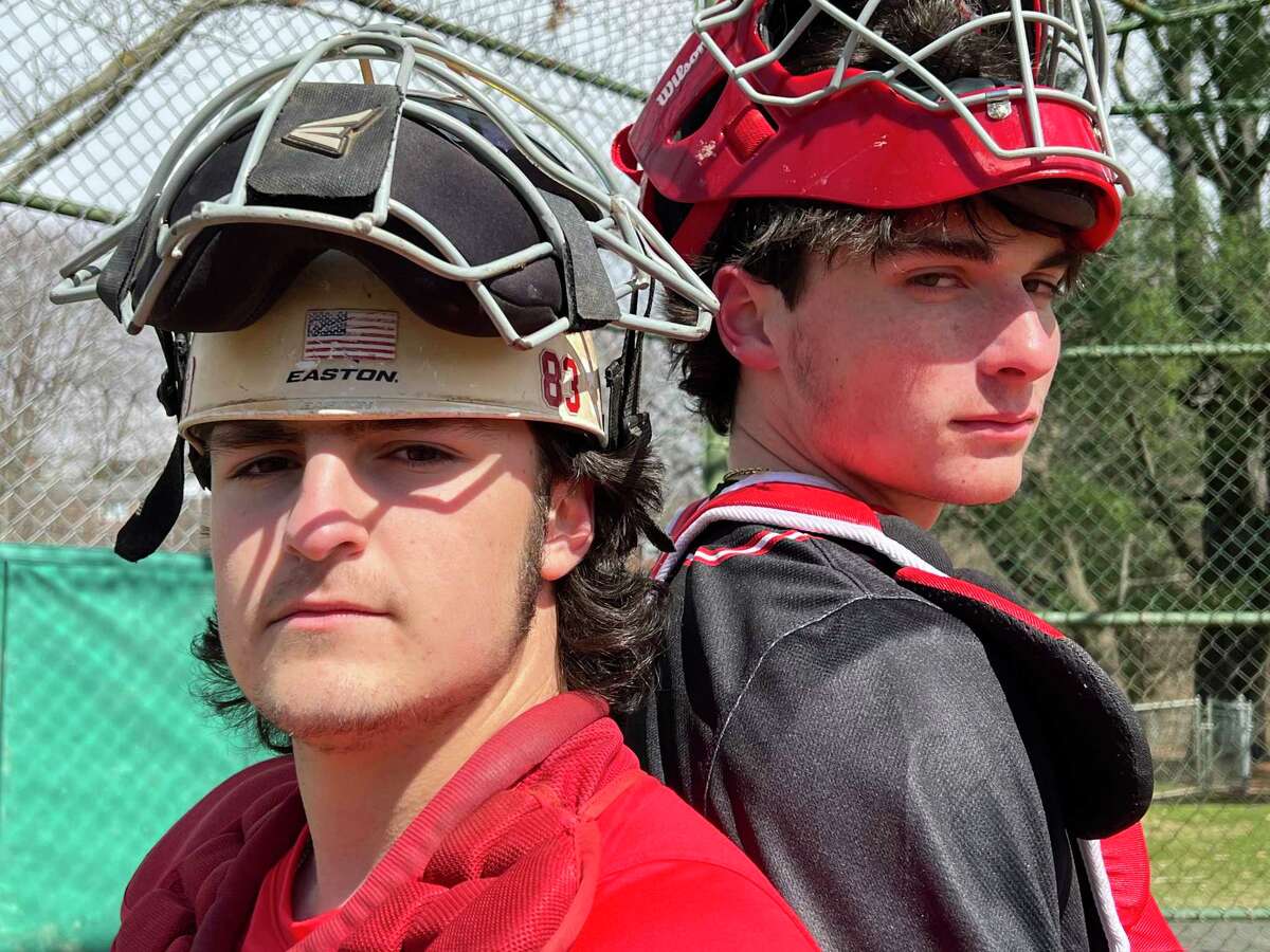 New Canaan's Zack Ramppen and Fairfield Warde's Roman DiGiacomo are two of the best catchers in the state this season. The duo poses at Mead Park, New Canaan on Monday, March 28, 2022.