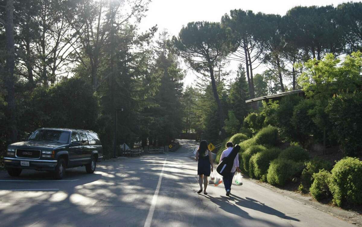 Students walk through the campus at the Woodside Priory School in Portola Valley in 2009.