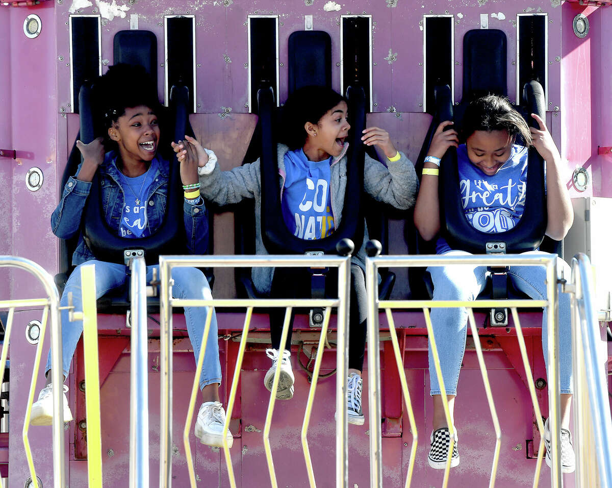 Students react as they take a ride on the Super Shot on BISD's Fair Day at the YMBL South Texas State Fair Thursday. Nearly 2,500 elementary and middle schoolers converged on the fairgrounds for their first district-wide fair event. Photo made Thursday, March 31, 2022 Kim Brent/The Enterprise