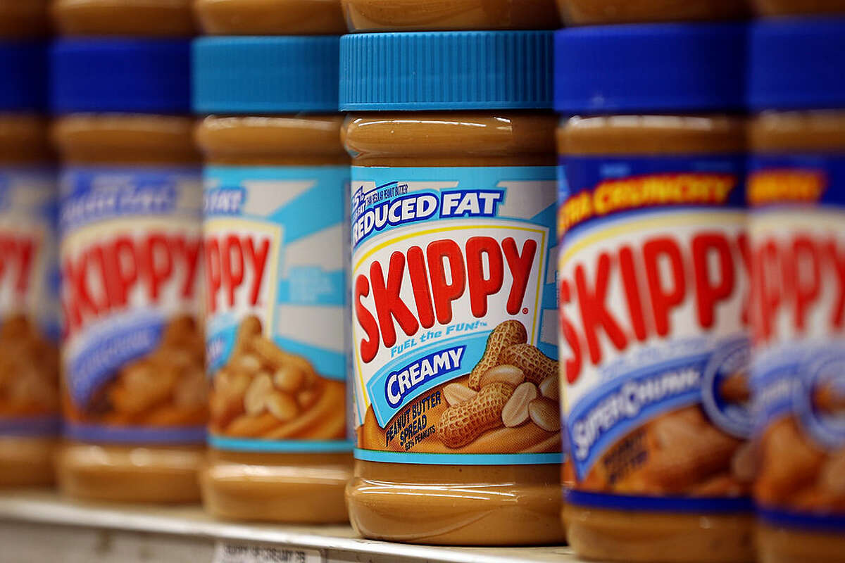 Jars of Skippy peanut butter are displayed on a shelf at Cal Mart grocery store on Jan. 3, 2013 in San Francisco. (Photo by Justin Sullivan/Getty Images)