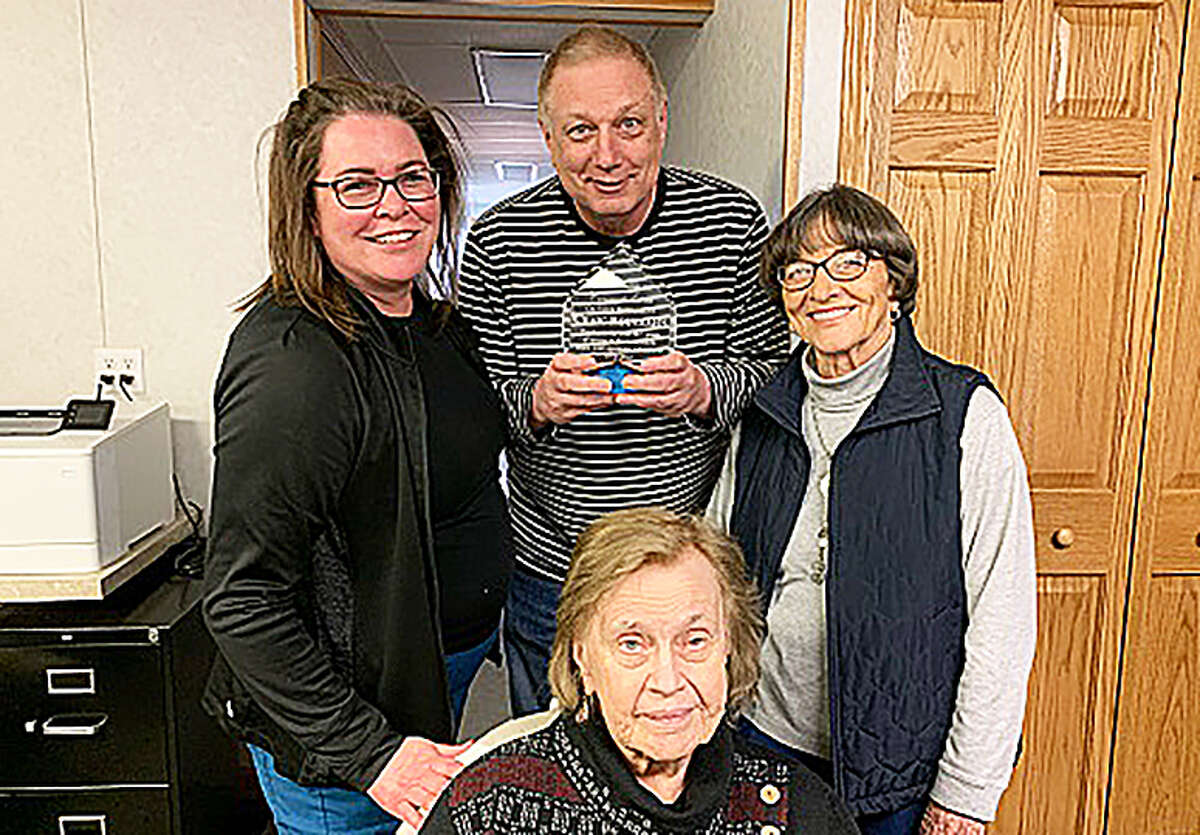 WLEW News Director Craig Routzahn poses with co-workers in this photo supplied by the radio station. Routzahn retired on Friday, signing off after a 46-and-a-half-year career. 
