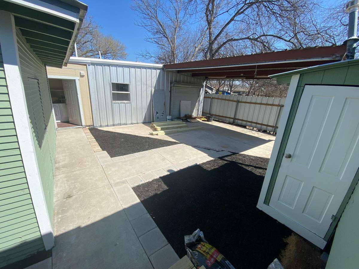 There is a pretty roomy shed in the backyard, but it'll cost you to use it.