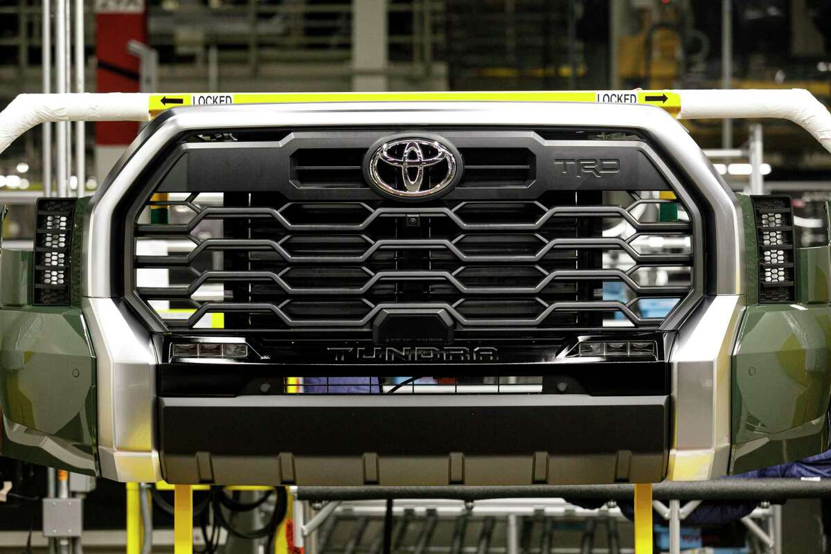 A 2022 Toyota Tundra grill sits out on the assembly line floor at Toyota Motor Manufacturing Texas in San Antonio, Texas, Friday morning, Dec. 3, 2021.