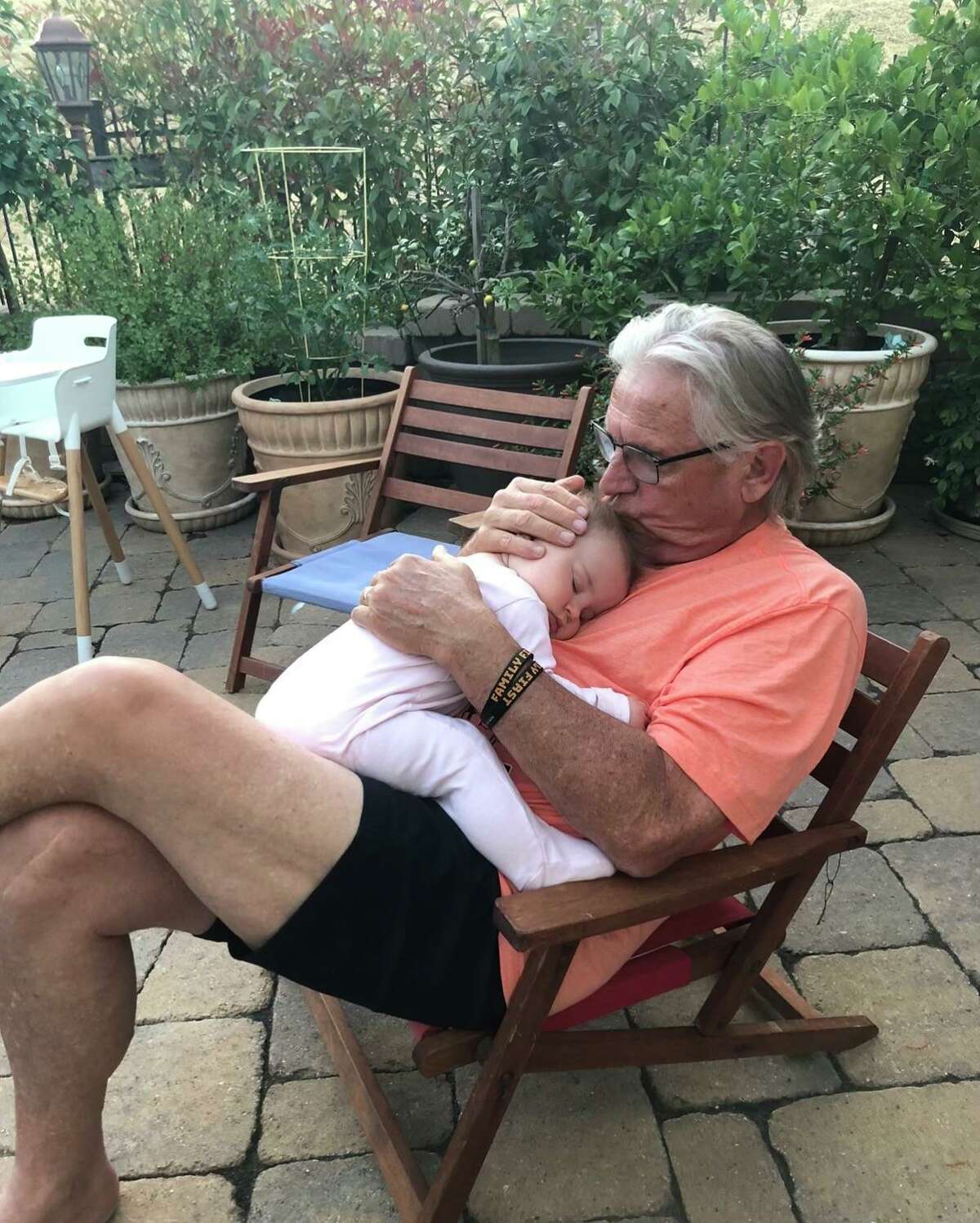 Duane Kuiper with his 5-month-old granddaughter, Kit.