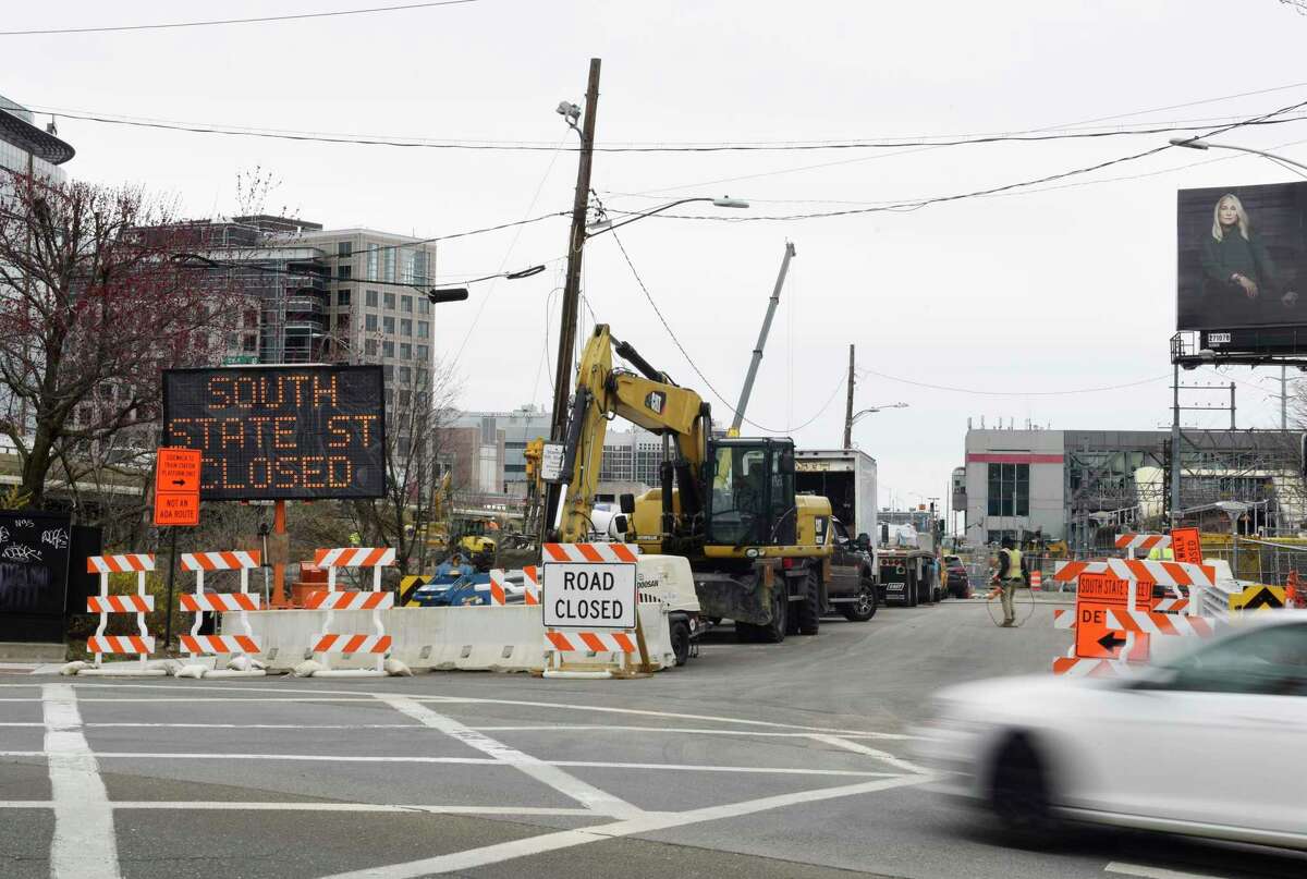 Construction continues on South State Street near the train station in Stamford, Conn. Wednesday, March 30, 2022.