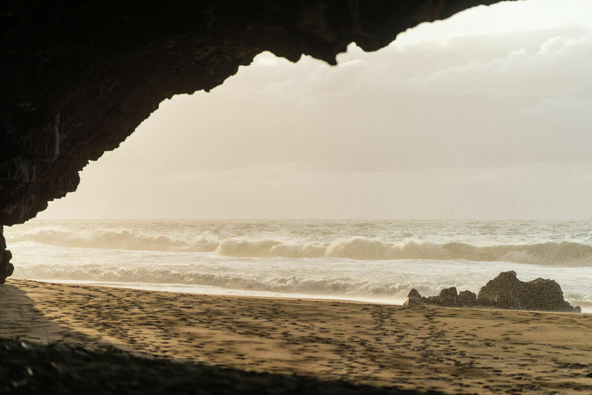 Taken from inside a cave at Kalalau Beach, Kauai.