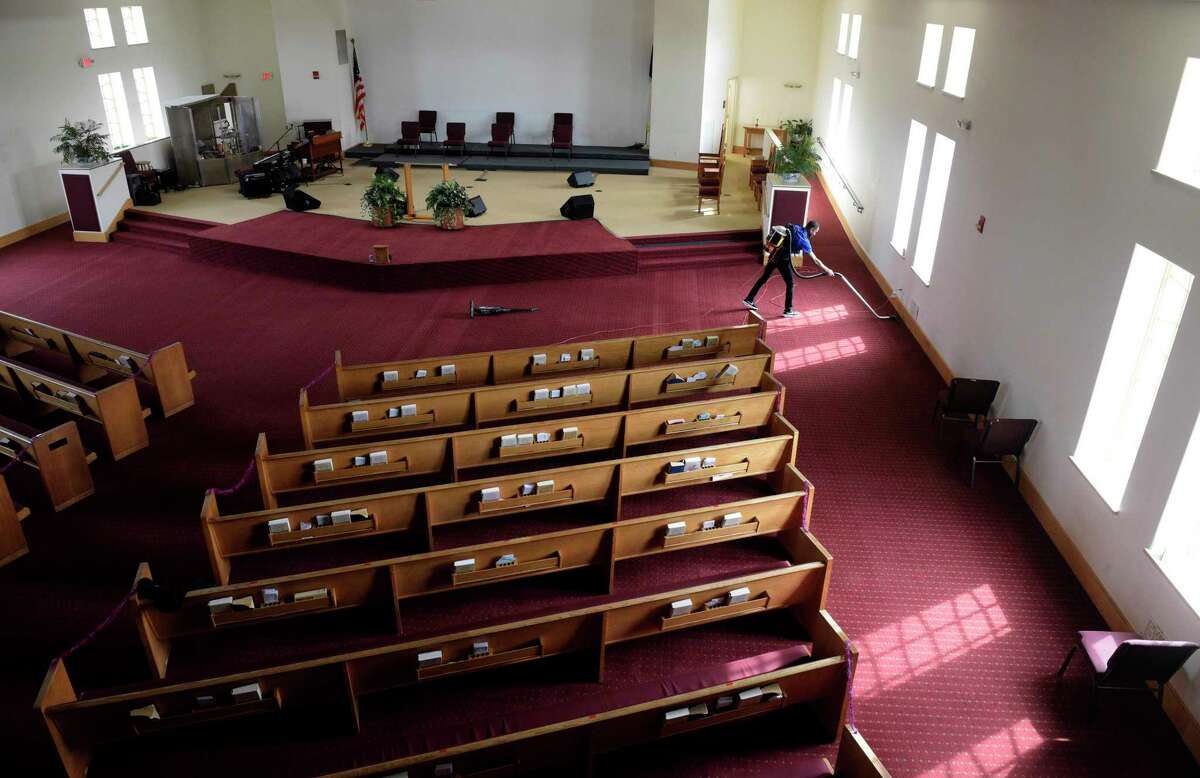 Michael Wright, of Danbury, Wright Way Cleaning in 2011, cleans in New Hope Baptist Church on Tuesday morning. He started the company the year after he was released from prison. The Danbury resident seeks to support and help others reentering the workforce and society after leaving prison. He is involved with a fair the Greater Danbury Reentry Collaborative is hosting on April 11 to bring together businesses and "returning citizens" who could help fill the labor shortage. Wednesday, March 30, 2022, Danbury, Conn.