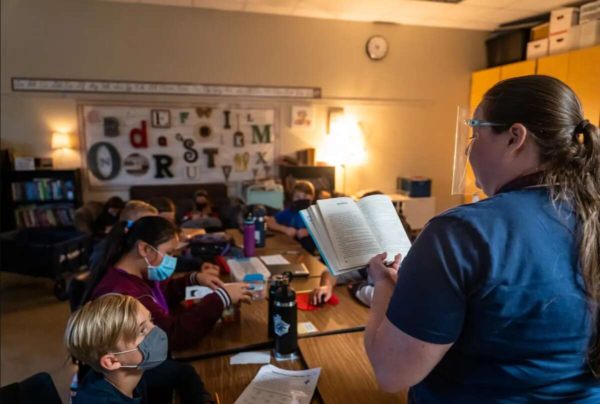 Teacher Melissa Perry reads to her fifth grade class at Jacob’s Well Elementary School in Wimberley on September 4, 2020.