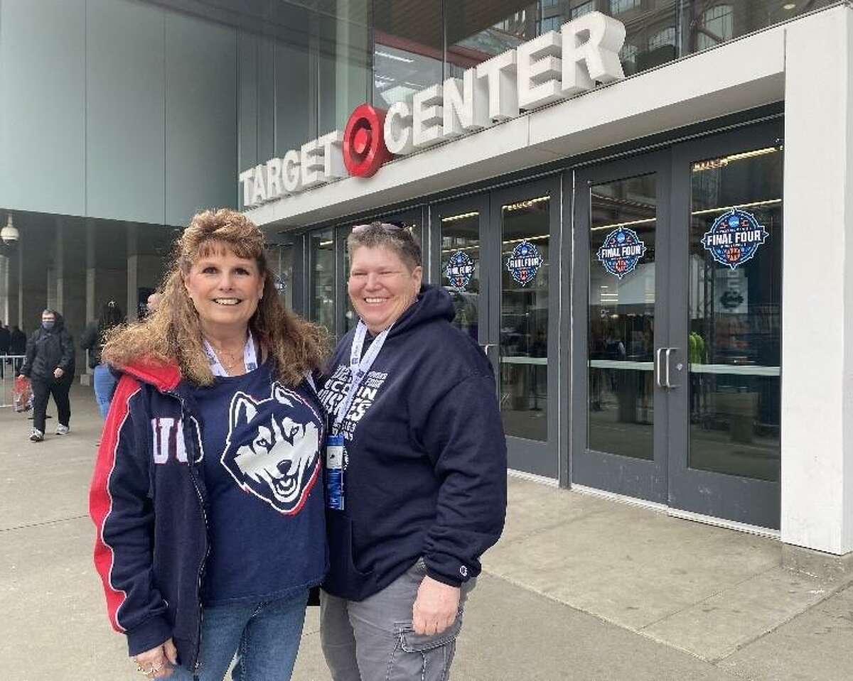 UConn fans Lorraine MacIntyre and Sue Langer in front of the Target Center in Minneapolis before the UConn-Stanford national semifinal game Friday, April 1, 2022.