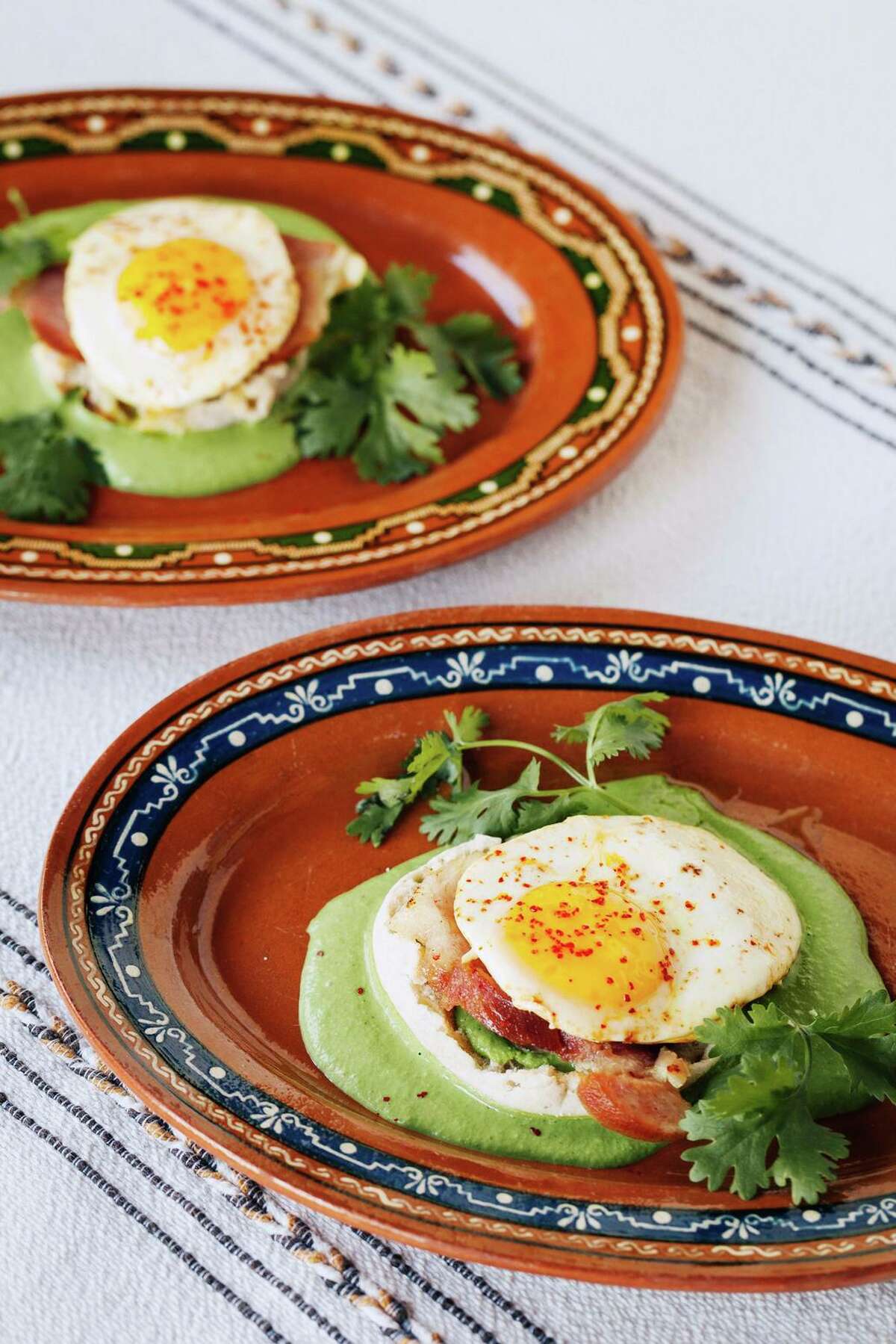 Green eggs and ham from Sally Schmitt’s cookbook “Six California Kitchens.” The sauce gets its color from green herbs and chiles.