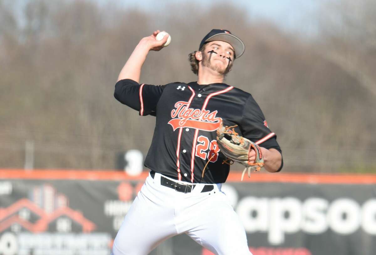 Edwardsville's Spencer Stearns delivers a pitch during Friday's game against Columbia at Tom Pile Field in Edwardsville.