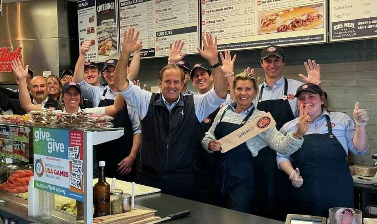 Brian O'Hagan, vice president of franchise sales at Jersey Mike's Franchise Systems Inc., celebrates with his employees at Jersey Mike's Subs at the Riverside Shopping Center. They are preparing for Jersey Mike's Day on March 30, when 100 percent of all sales were donated to help Team Connecticut attend the 2022 Special Olympics USA Games this summer in Orlando.