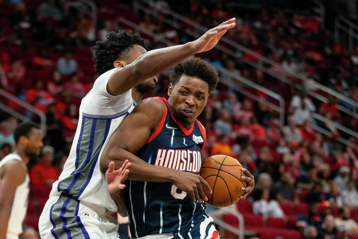 Houston Rockets forward Jae'Sean Tate (8) drives during the second half of the Houston Rockets loss to the Sacramento Kings on Friday, April 1, 2022, at Toyota Center in Houston.