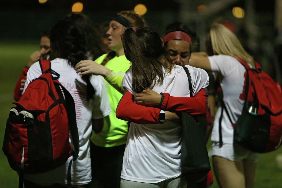 Members of the Taft soccer team embrace after the regional quarterfinal against O'Connor Friday, April 1, 2022, at Northside Field No. 1 in San Antonio, Texas. [Sam Grenadier/San Antonio Express-News]