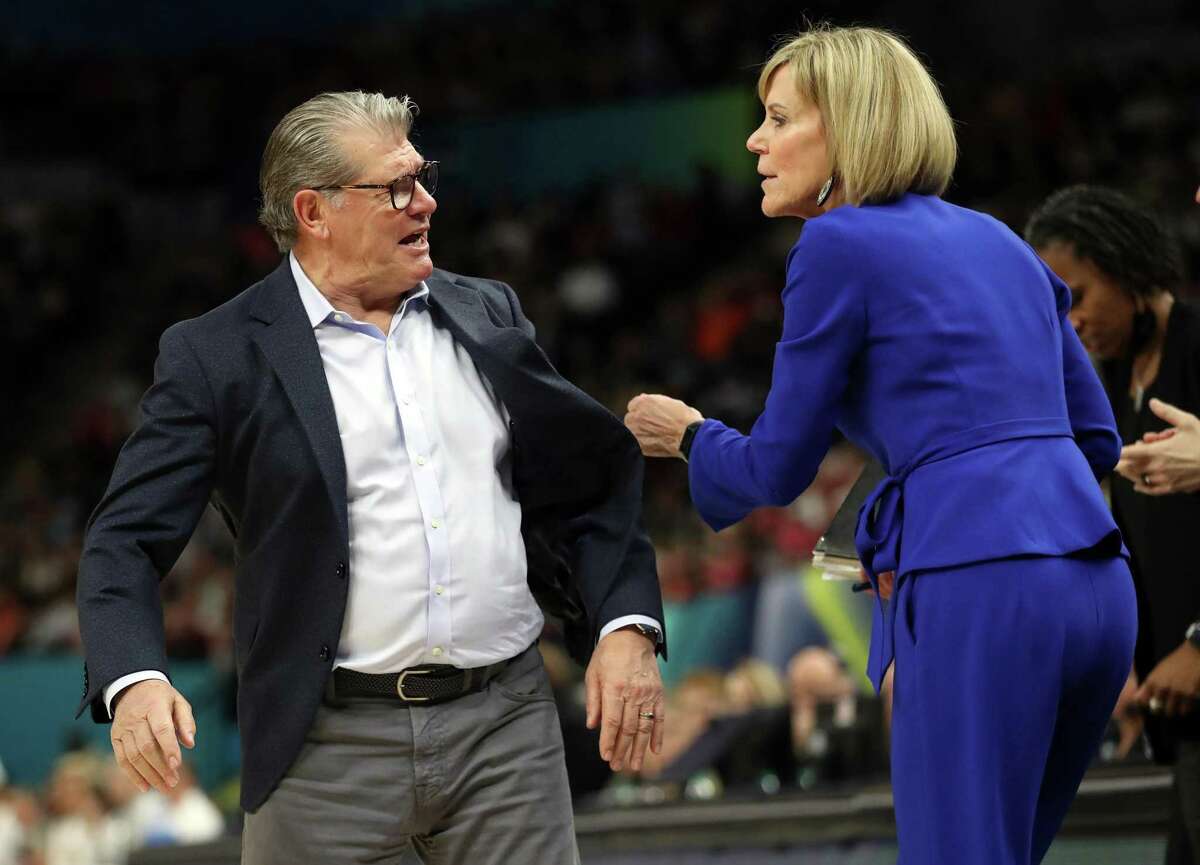 UConn head coach Geno Auriemma loses his temper with associate head coach Chris Dailey in 2nd quarter against Stanford during NCAA Women?•s Basketball Final Four semifinal at Target Center in Minneapolis, MN on Friday, April 1, 2022.