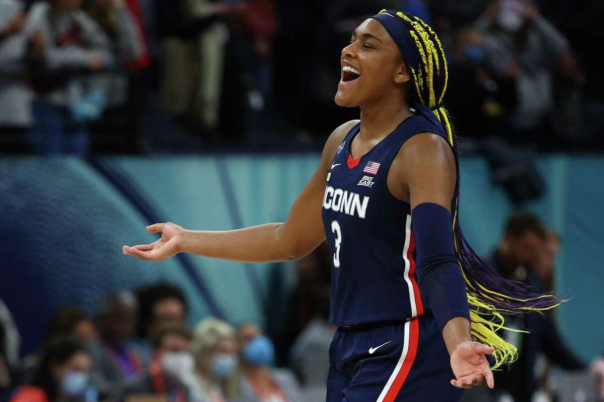 MINNEAPOLIS, MINNESOTA - APRIL 01: Aaliyah Edwards #3 of the UConn Huskies reacts after defeating the Stanford Cardinal 63-58 during the 2022 NCAA Women's Final Four semifinal game 2 at Target Center on April 01, 2022 in Minneapolis, Minnesota. (Photo by Elsa/Getty Images)