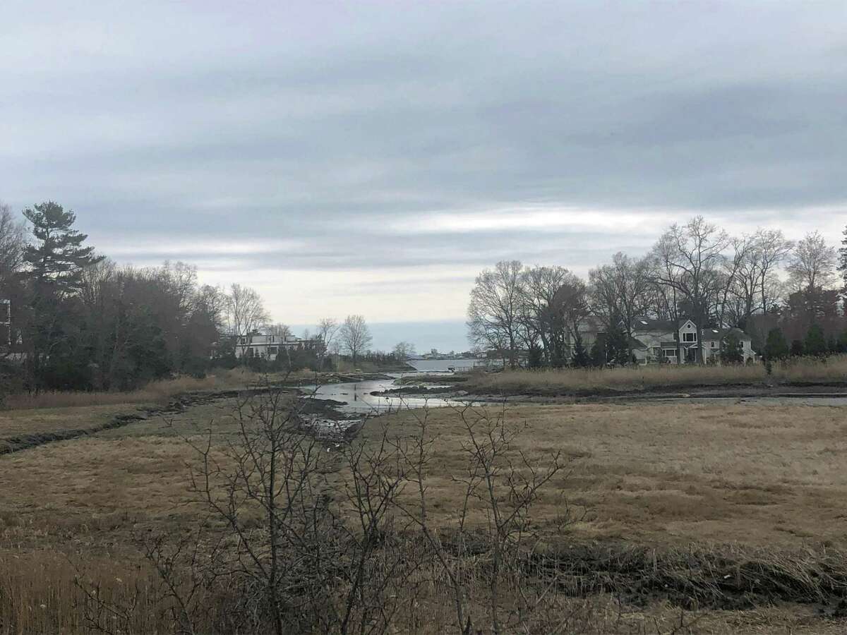 A cloudy sky over the wetlands by the Westport train station on April 11, 2019.