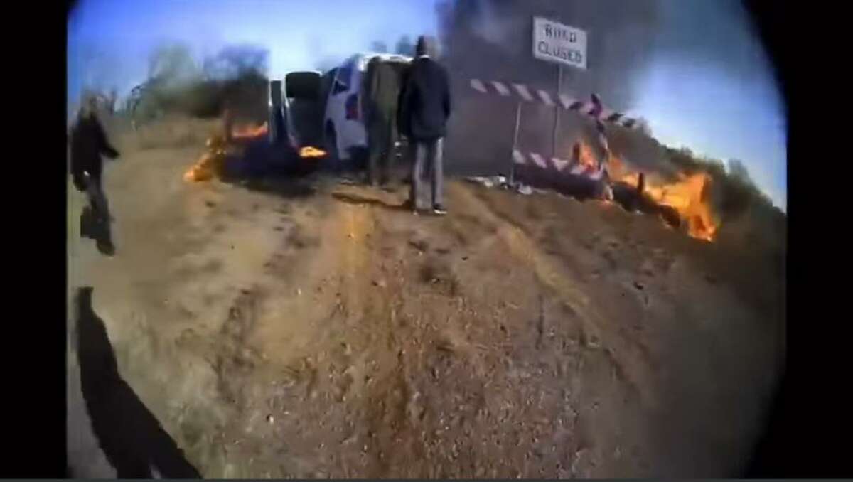 Body cam footage from a Texas Department of Public Safety trooper shows authorities rescuing a migrant from a burning vehicle. She was inside a duffle bag.