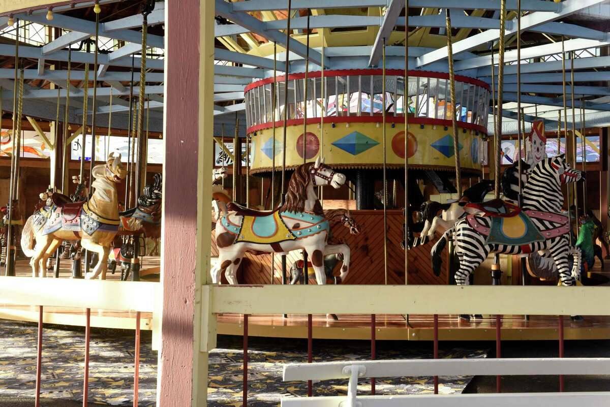 A carousel is seen in 2020 through a window of a building on the grounds of the former Sherman Amusement Park in Caroga Lake. (Lori Van Buren/Times Union)
