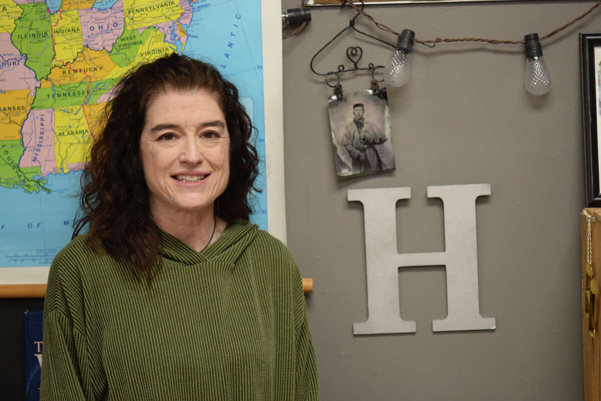 Routt Catholic High School teacher Lisa Hall has a photo of her Civil War-serving ancestor displayed in her classroom.