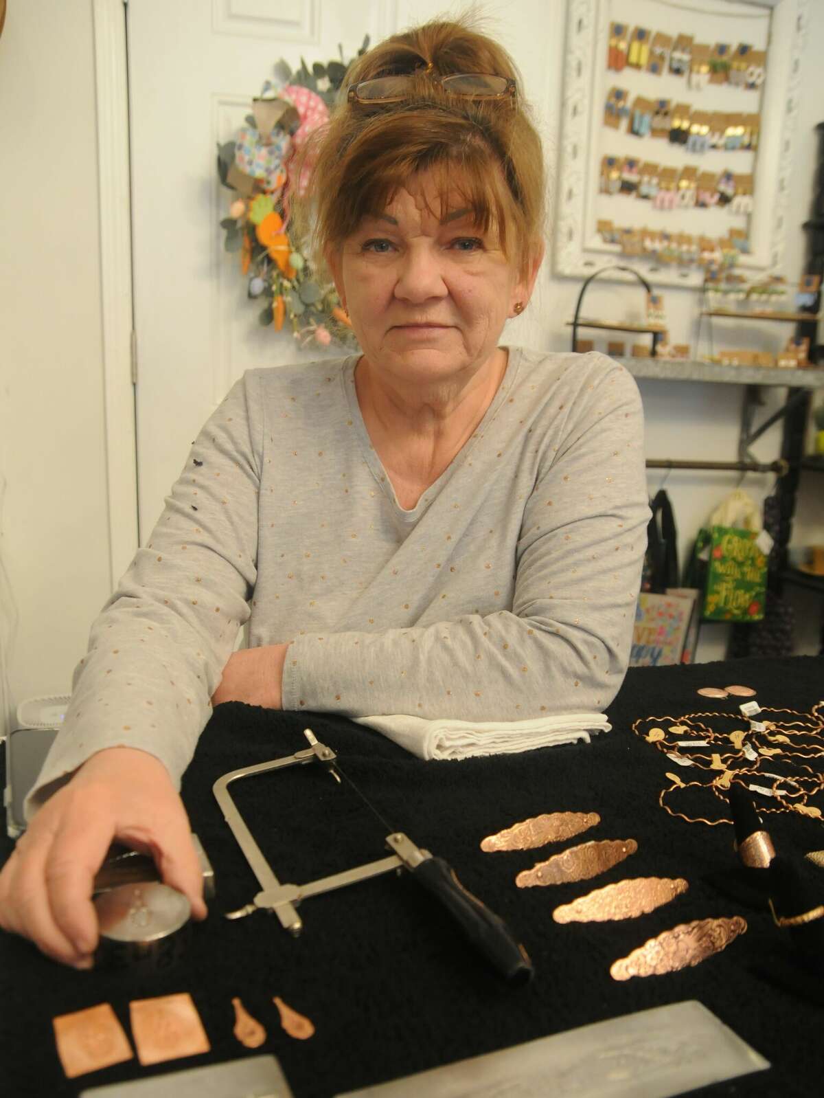 Colleen Marmino of Shipman gets ready to demonstrate a jewelry-making technique during a recent Saturday at Ruby Wren Eclectic Boutique in Alton. The business features works by about 20 artisans.