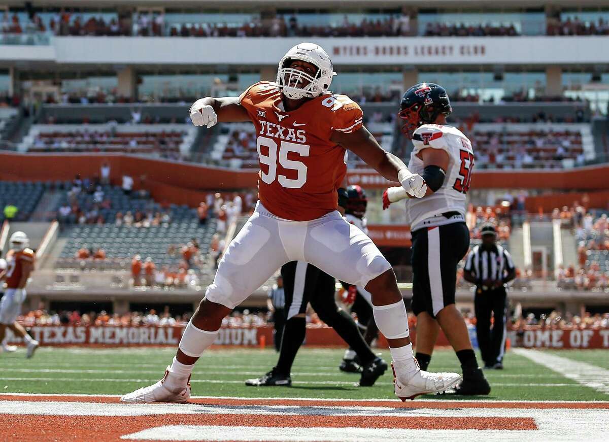 Alfred Collins of the Texas Longhorns reacts after a sack in the second half against the Texas Tech Red Raiders at Royal-Memorial Stadium on Sept. 25, 2021 in Austin.