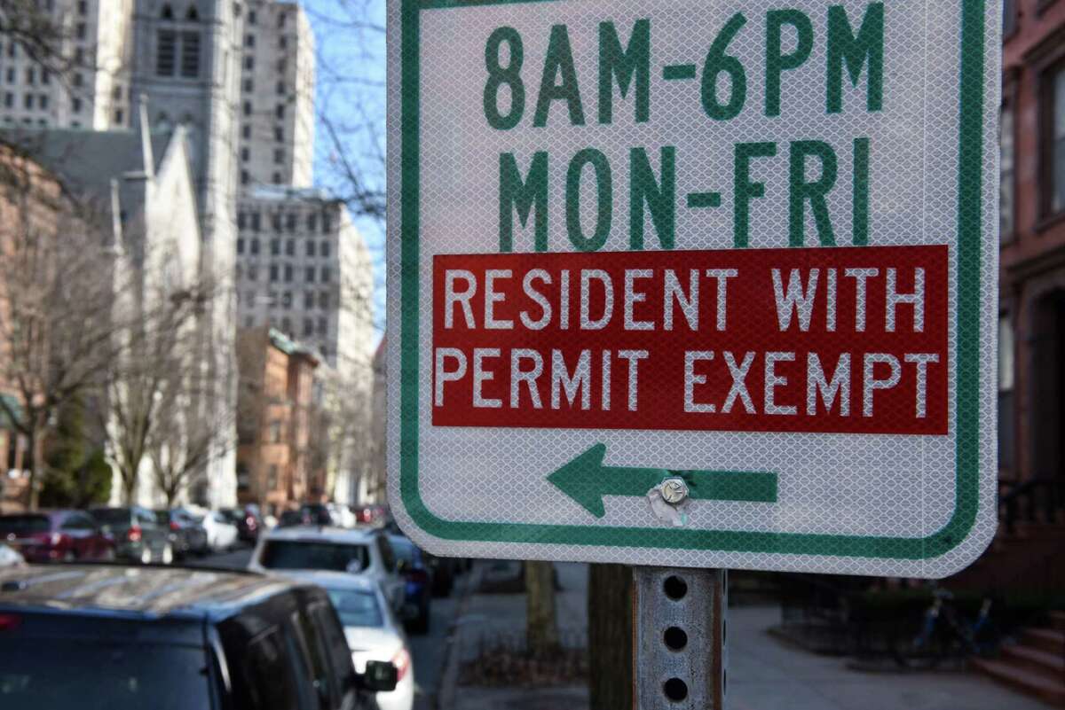 A residential parking permit sign is seen on Monday, March 9, 2020, on State Street near the Capitol in Albany. (Will Waldron/Times Union)