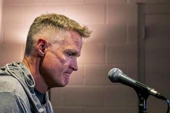 Golden State Warriors coach Steve Kerr speaks Sunday, April 3, 2022, to local media about gun legislation, following the shooting that left six people dead and 12 injured early Saturday in Sacramento, Calif. Kerr spoke before the team's NBA basketball game against the Sacramento Kings. (AP Photo/José Luis Villegas)